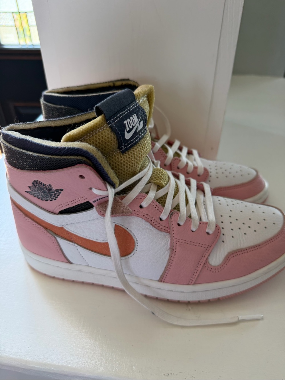Nike Air Jordan 1 Mid Sneakers in Pink, White & Orange
